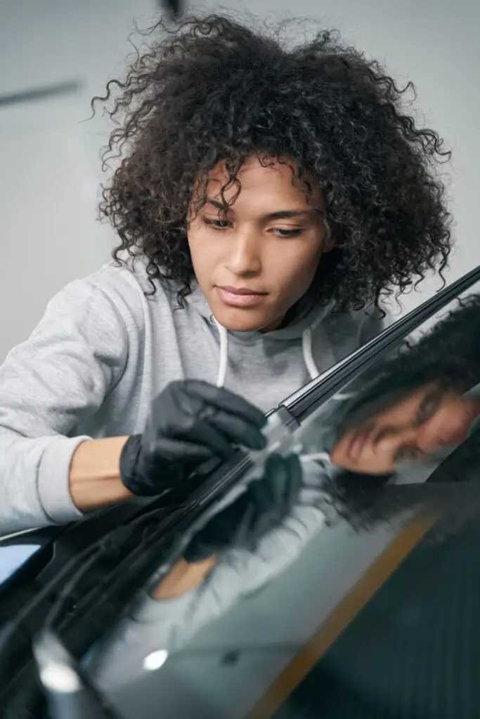 worker ceramic coating windscreen surface aft 2023 11 27 05 28 58 utc 1