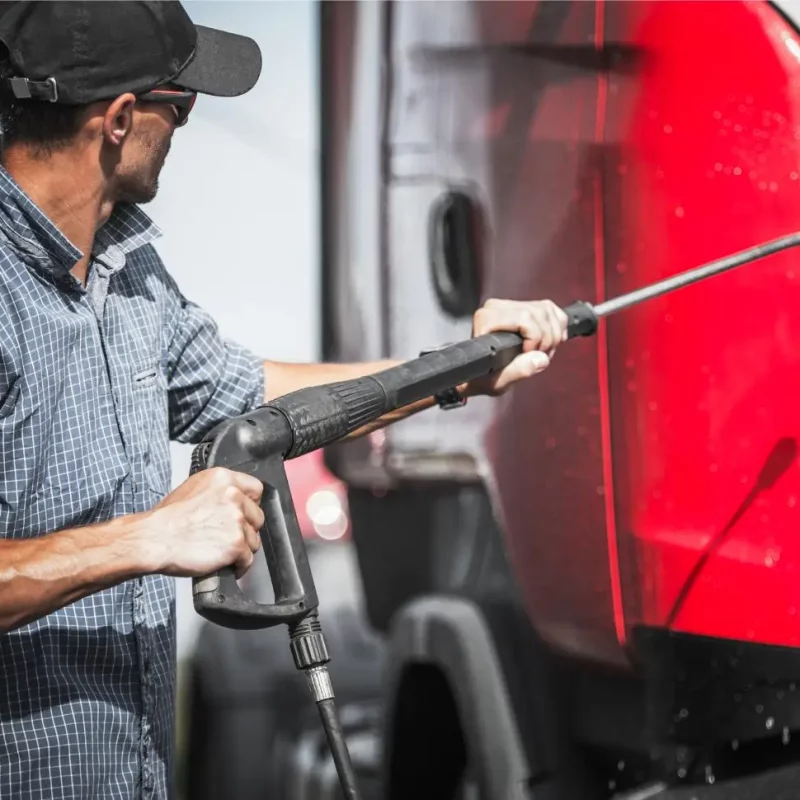 truck driver washing his vehicle using pressure wa 2023 11 27 05 17 40 utc